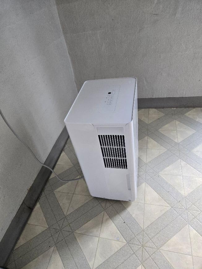 Amazon Basics 50-Pint Large Dehumidifier with Pump, Energy Star Certified, Humidity Control, Auto-Defrost, Timer, Overflow Protection for Rooms up to 4000 SFT, White customer photo 1