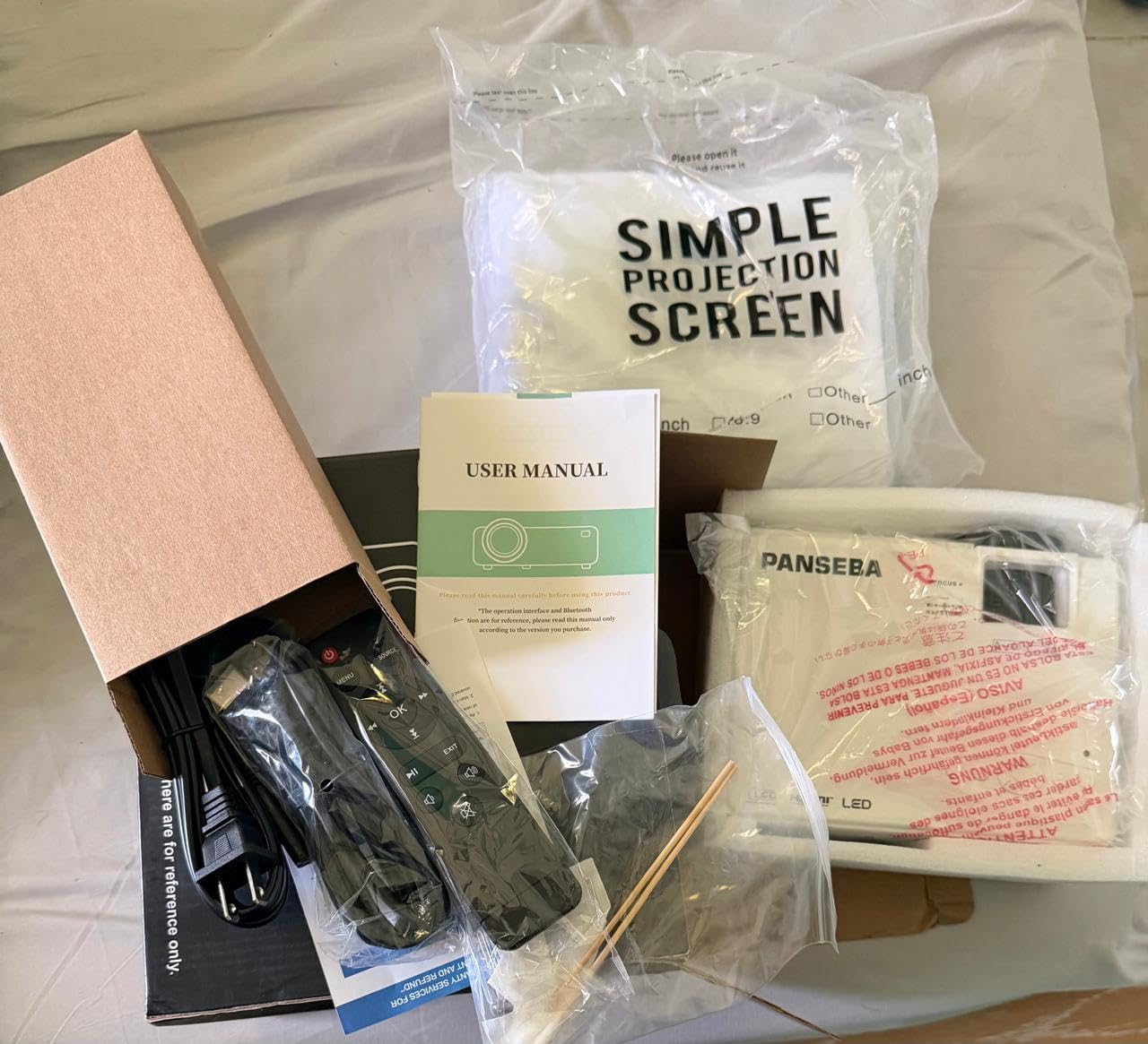 PANSEBA 1080P Mini Projector with Screen, Portable Home Theater Movie Projector with Two-Way Bluetooth, HDMI/USB Input for Smartphone/TV Stick, Ideal for Indoor & Outdoor Use customer photo 1