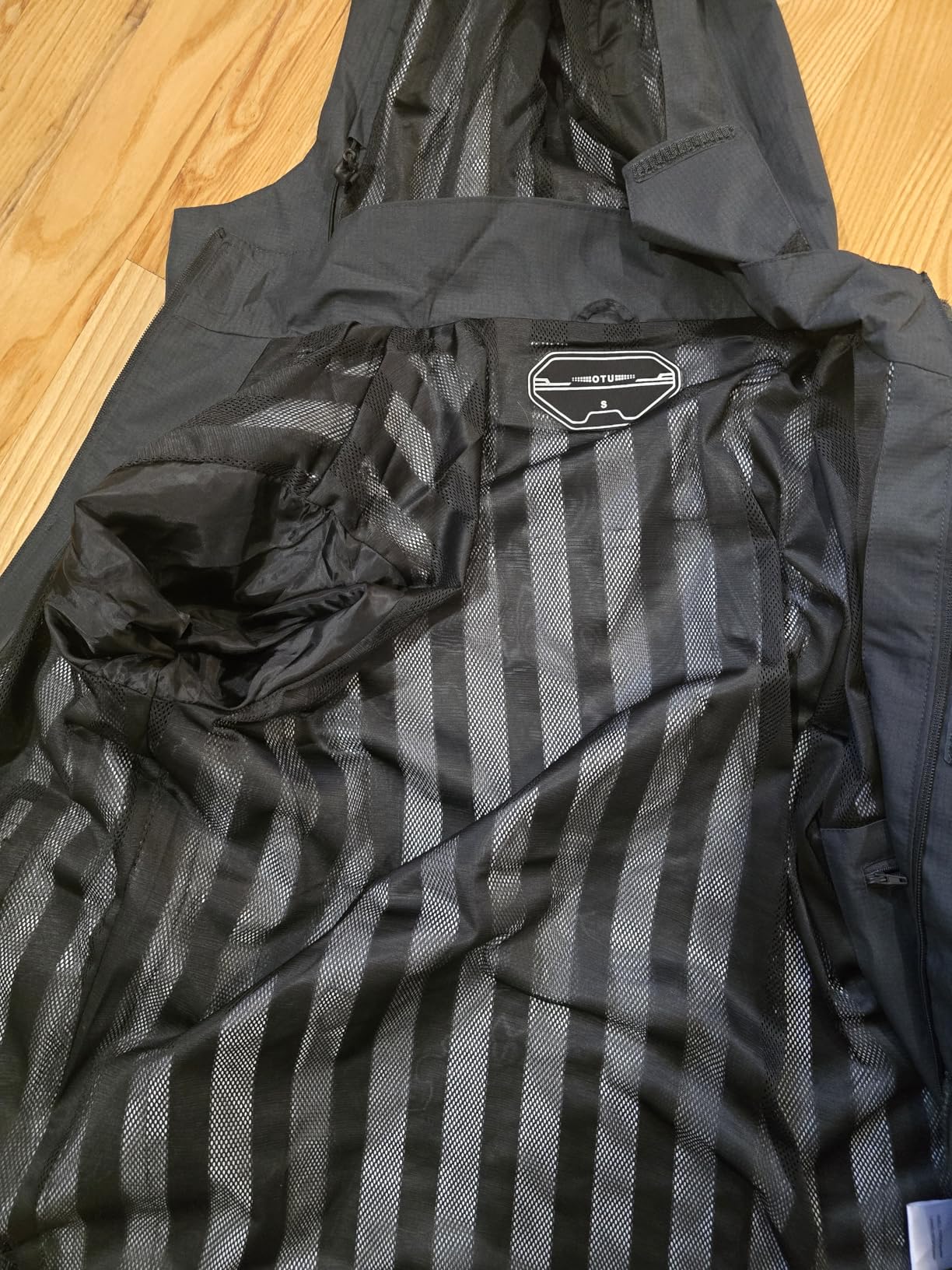 OTU Men's Lightweight Waterproof Hooded Rain Jacket Outdoor Raincoat Shell Jacket for Hiking Travel customer photo 2