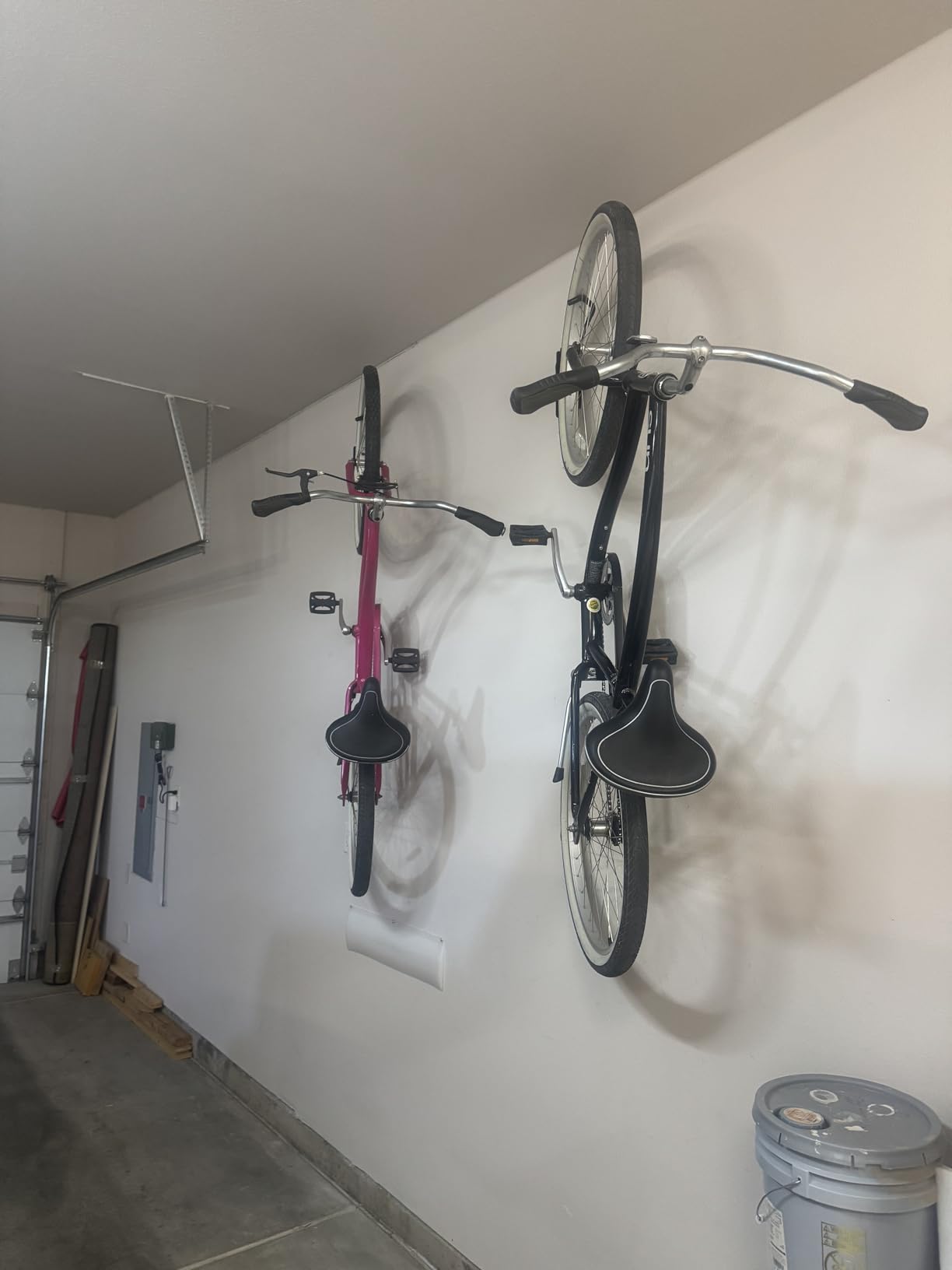 StoreYourBoard Bike Hangers for Garage | Garage Bike Rack Wall Mount, Vertical Bicycle Rack for Garage | 124° Swivel Bike Wall Mount with Stopper, Holds 50lbs, Fits All Wheel Diameters, Max 2.6