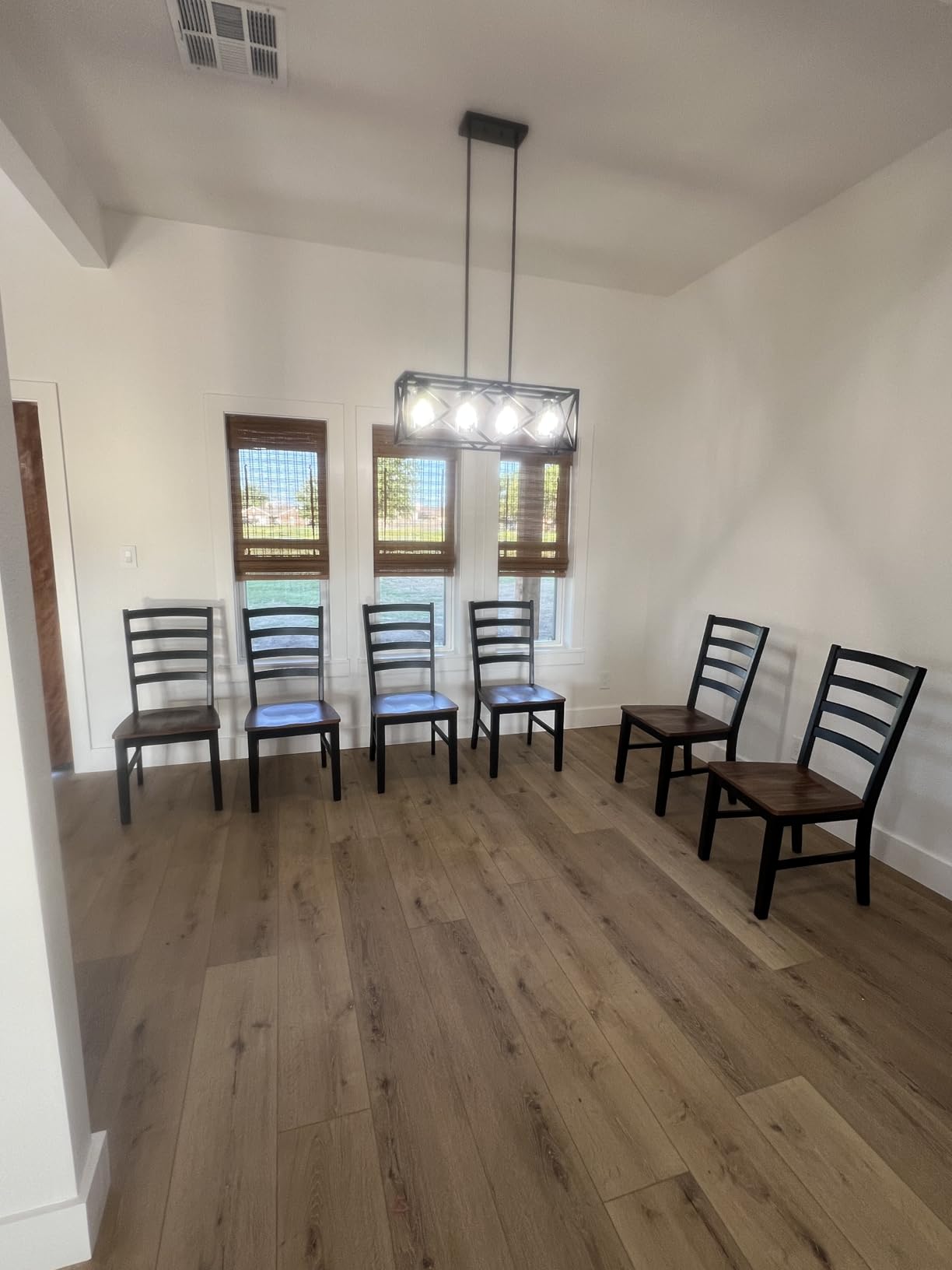 Signature Design by Ashley Wildenauer Dining Chairs Set of 2, Modern Ladderback Dining Chairs with Solid Wood Frame, Two-Tone Finish, Contoured Seat, Black/Brown customer photo 2