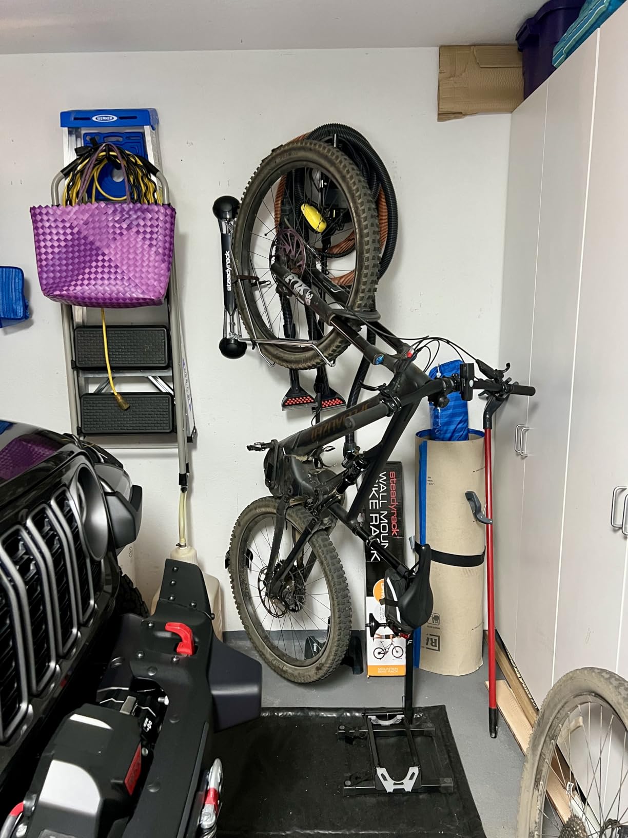 Steadyrack Bike Rack for Mountain Bikes - The Original Wall Mounted Vertical Bike Storage - Fits Wide Tires - Space Saving Pivot Design - Heavy-Duty Steel Rack for Indoor Garage, Apartment or Home Use customer photo 1