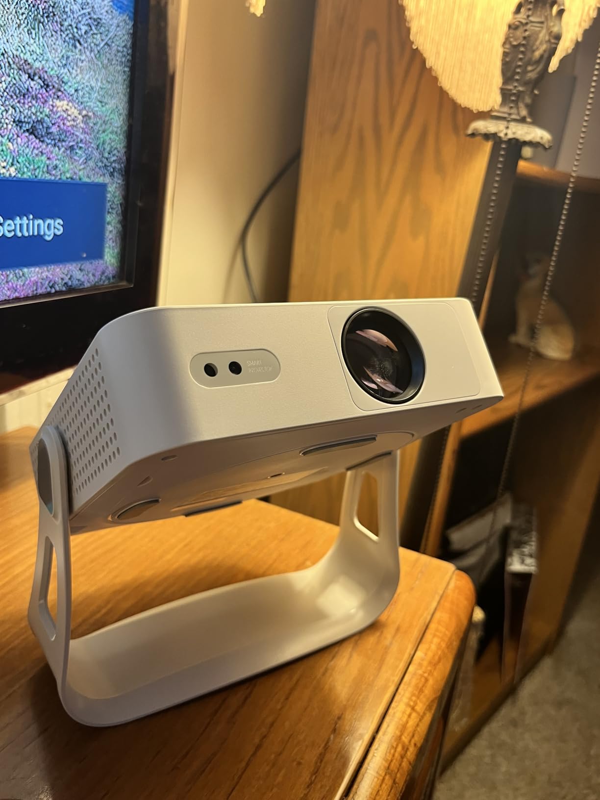 [Officially-Licensed App & Auto Focus] White Smart Mini Projector with WiFi and Bluetooth, XuanPad 4K Support Movie Projector, Portable Native 1080P Outdoor Projector with 360° Stand customer photo 1