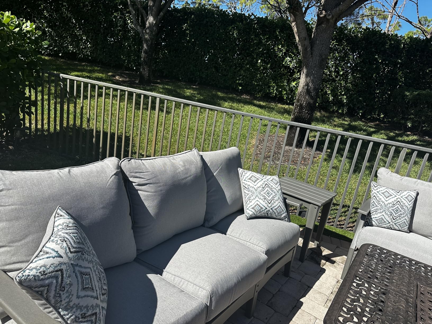 Signature Design by Ashley Visola Outdoor Patio Sofa with All-Weather Cushion and 2 Throw Pillows, Cleanable Performance Fabric, 19.88