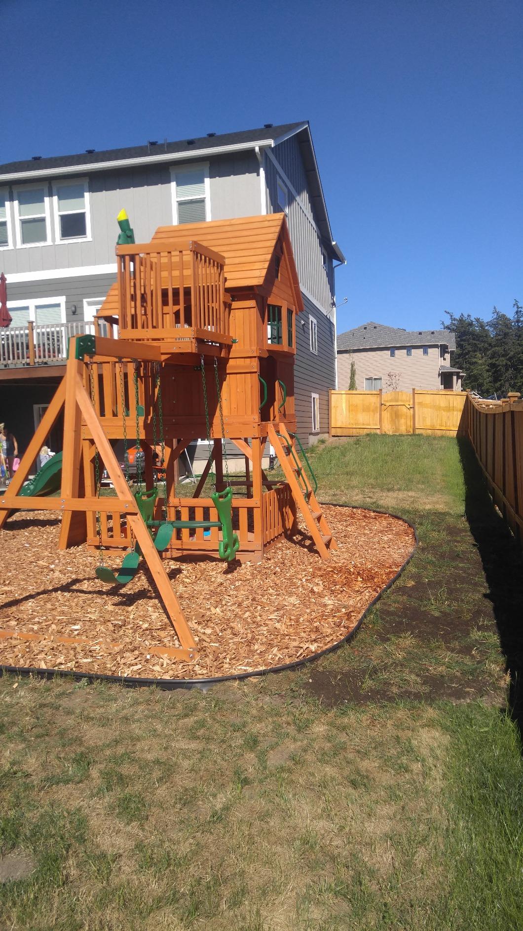 Backyard Discovery Skyfort II Cedar Wood Swing Set with Wave Slide, Raised Clubhouse, Crow's Nest, Monkey Bars, Balcony, Belt Swings, Trapeze, Rock Wall, Picnic Table, Sandbox, Ladder, Outdoor Playset customer photo 1
