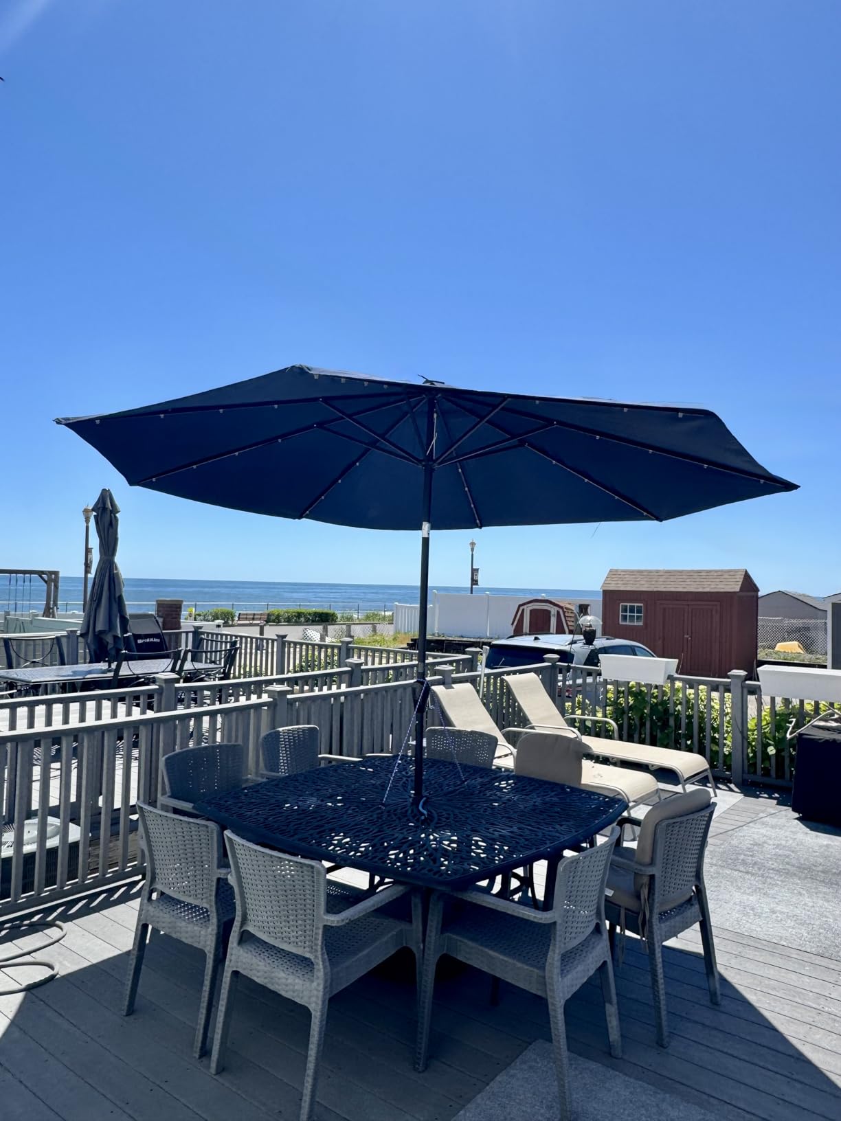 ABCCANOPY Solar Led Patio Umbrella with 32 Lights 9FT(Navy Blue) | Fade & UV Resistant Fabric,8 Heavy-Duty Ribs,Waterproof,Wind Vent Top,Crank & 45° Tilt,Ideal for Patio,Backyard,Garden customer photo 1