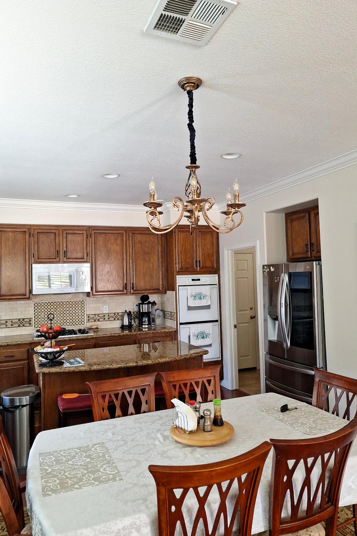 Ganeed Rustic Chandeliers, 8 Lights Candle French Country Chandelier, Vintage Iron Pendant Light Fixture Hanging Light for Farmhouse, Kitchen Island, Dining Room, Bedroom customer photo 2