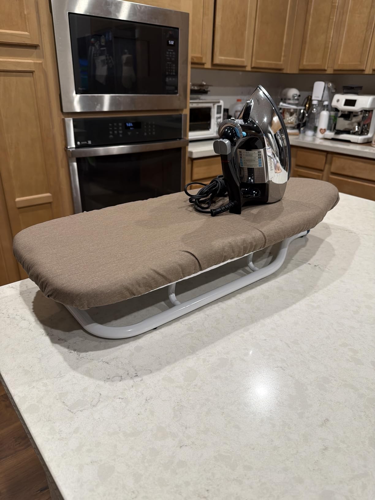 Amazon Basics Foldable Space Saving Ironing Board Tabletop with Non-Slip Feet, 77x29 cm, White, Floral customer photo 2