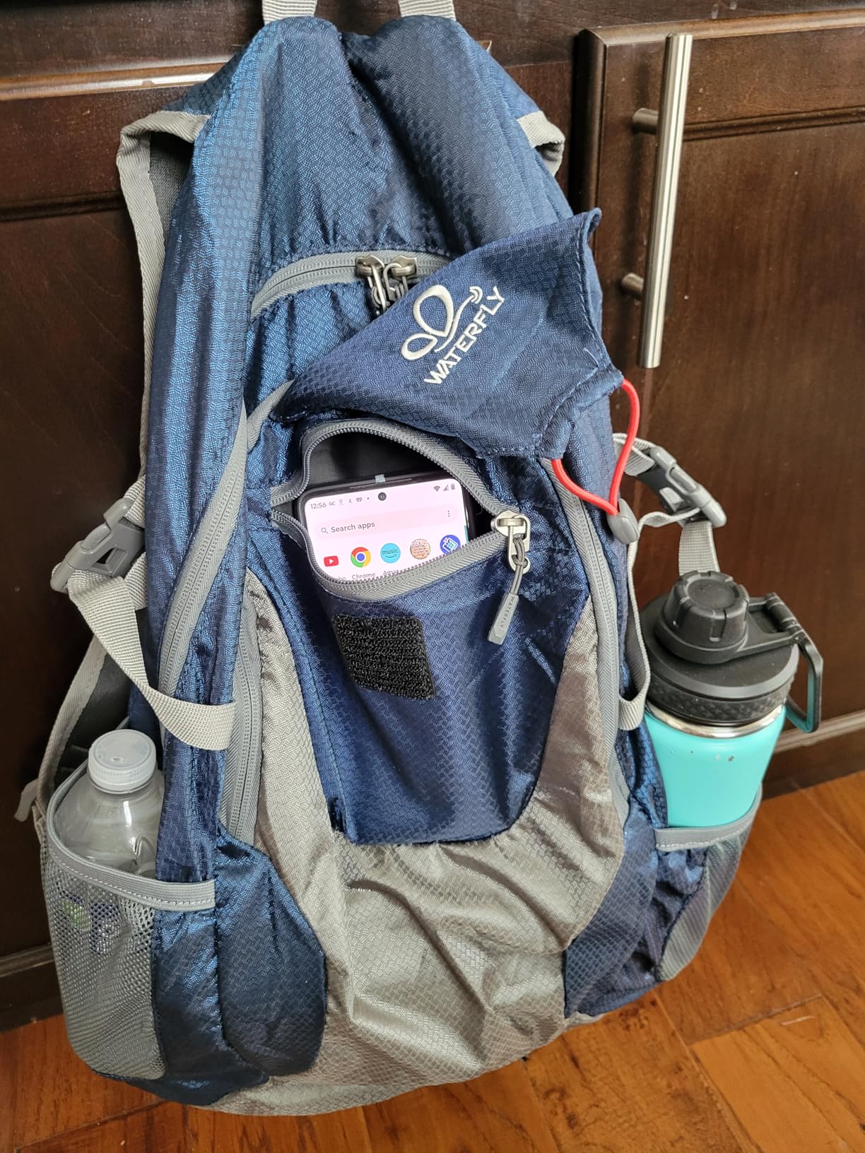 WATERFLY Lightweight Packable Hiking Backpack, 30L Day Pack Blue | Water Resistant Foldable Travel Daypack with Multiple Pockets, Wet Pocket, Ultralight Day Pack for Woman Man, Everyday Carry customer photo 1