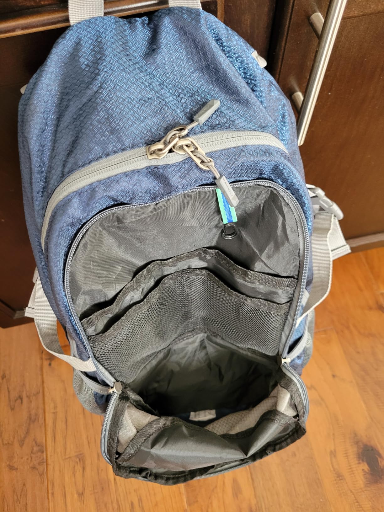 WATERFLY Lightweight Packable Hiking Backpack, 30L Day Pack Blue | Water Resistant Foldable Travel Daypack with Multiple Pockets, Wet Pocket, Ultralight Day Pack for Woman Man, Everyday Carry customer photo 2