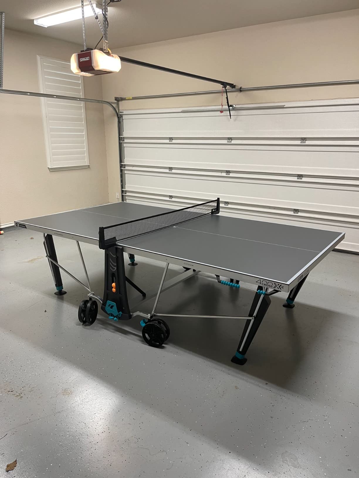 CORNILLEAU - 400X Outdoor Table Tennis Table - 5mm Weatherproof Surface, Anti-Glare Coating, Adjustable Legs, Paddle & Ball Storage, Foldable Design, Point Counters - 5 mm Blue or Grey customer photo 1