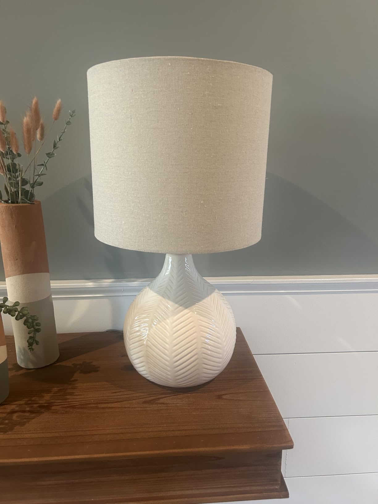 Signature Design by Ashley Rainermen Casual Ceramic Table Lamp, Transparent White Glaze Finish, Drum Hardback Fabric Shade, 11