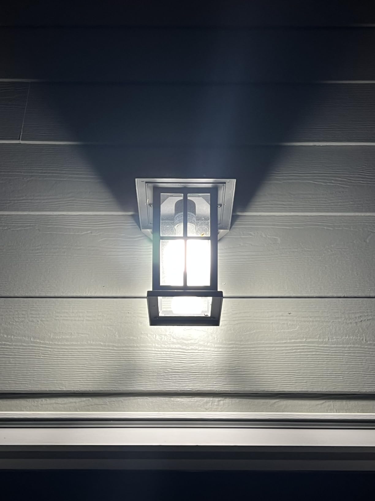 TJOY Dusk to Dawn Light Bulbs Outdoor, Light Sensor A19 LED Light Bulb, Automatic on/Off Photocell Bulb for Outdoor Porch Lighting, 60W Equivalent, Energy Efficient 9W, Daylight 5000K,E26 Base, 4 Pack customer photo 1