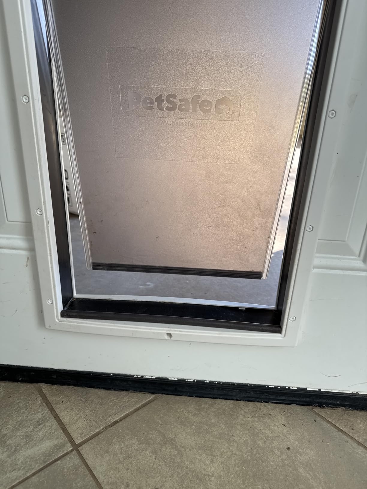 PetSafe Plastic Dog & Cat Door, Pets Up to 220 lb, X-Large | Flap Opening 13 5/8 in W x 23 5/8 in H, Snap-on Closing Panel, Paintable Frame, Easy DIY Install customer photo 2