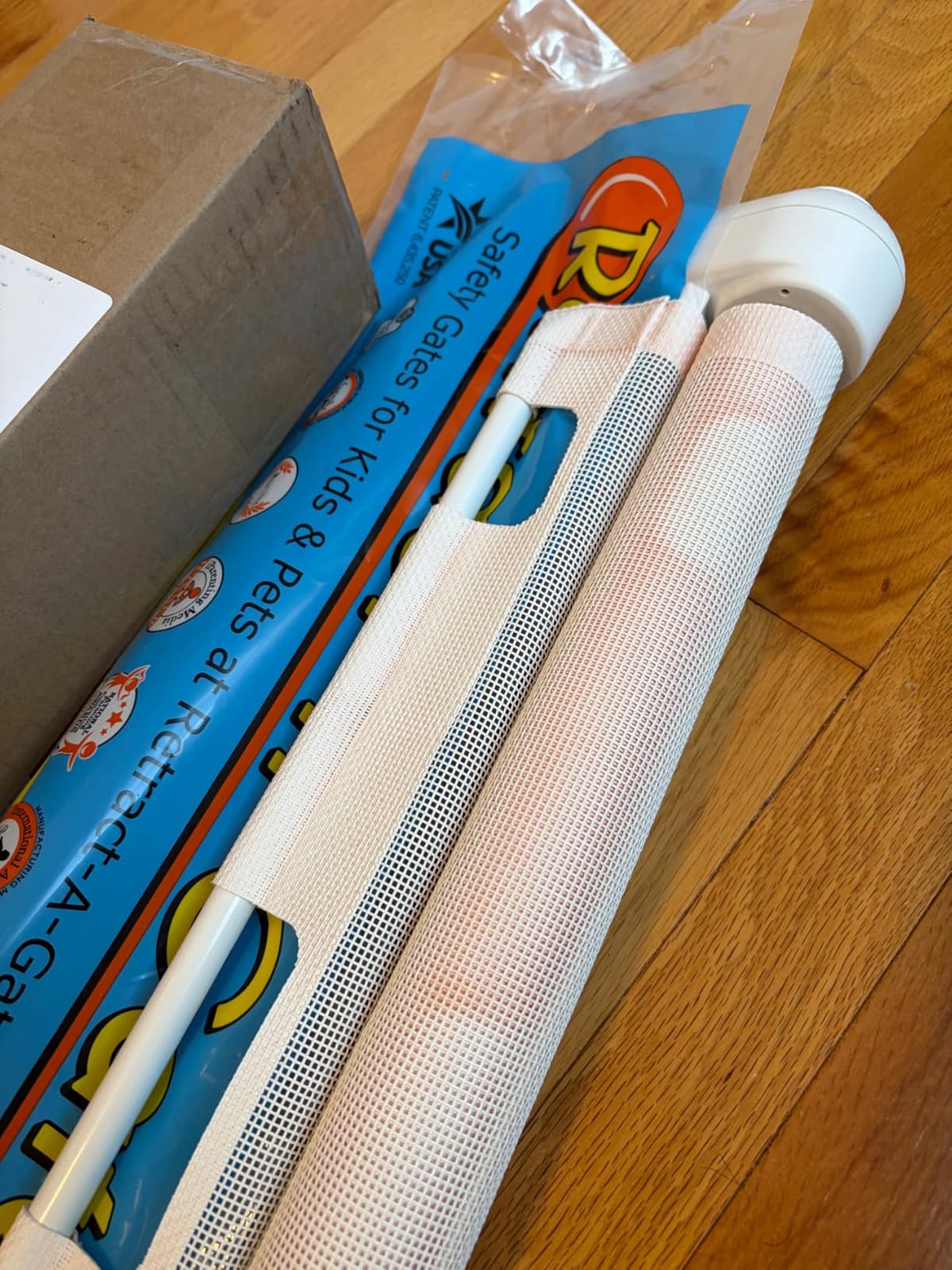 Retract-A-Gate 52 Inch White Retractable Baby and Dog Gate, Made in USA customer photo 2