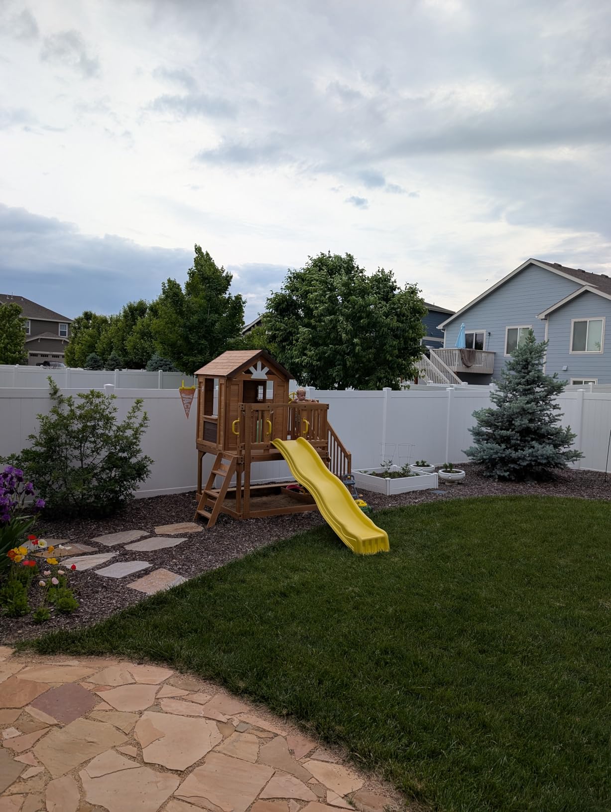 Backyard Discovery Scenic Heights Elevated Cedar Wooden Kids Playhouse with Play Kitchen, Wrap-Around Deck, Toy Storage Bench, Saloon-Style Doors, Ladder, Stairs, and Growth Chart for Outdoor Play customer photo 2