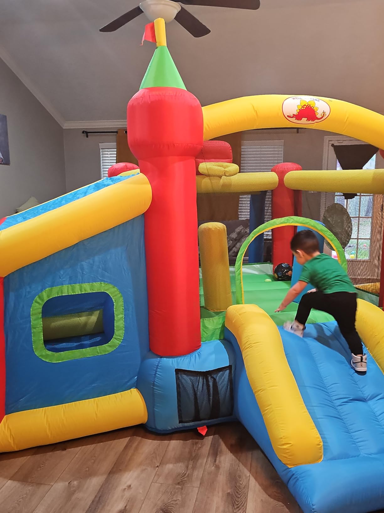 WELLFUNTIME Inflatable Bounce House, Jumping Castle Slide with Blower, Kids Bouncer with Ball Pit | Ball Pit, Basketball Hoop, Soccer Goal, Dart Target, Jumping Castle for Ages 3-10, Backyard Outdoor, 145.5x120x85 Inch customer photo 1