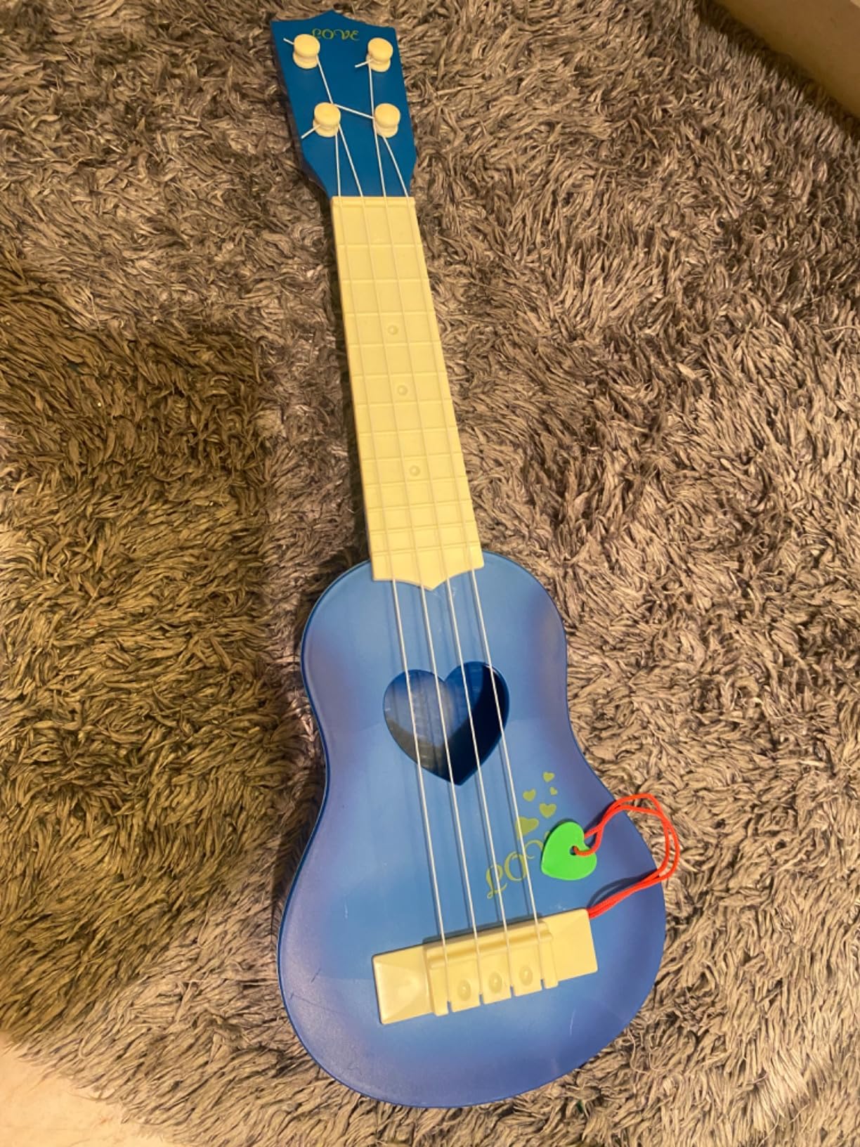YEZI Kids Toy Classical Ukulele Guitar Musical Instrument for Kids customer photo 1