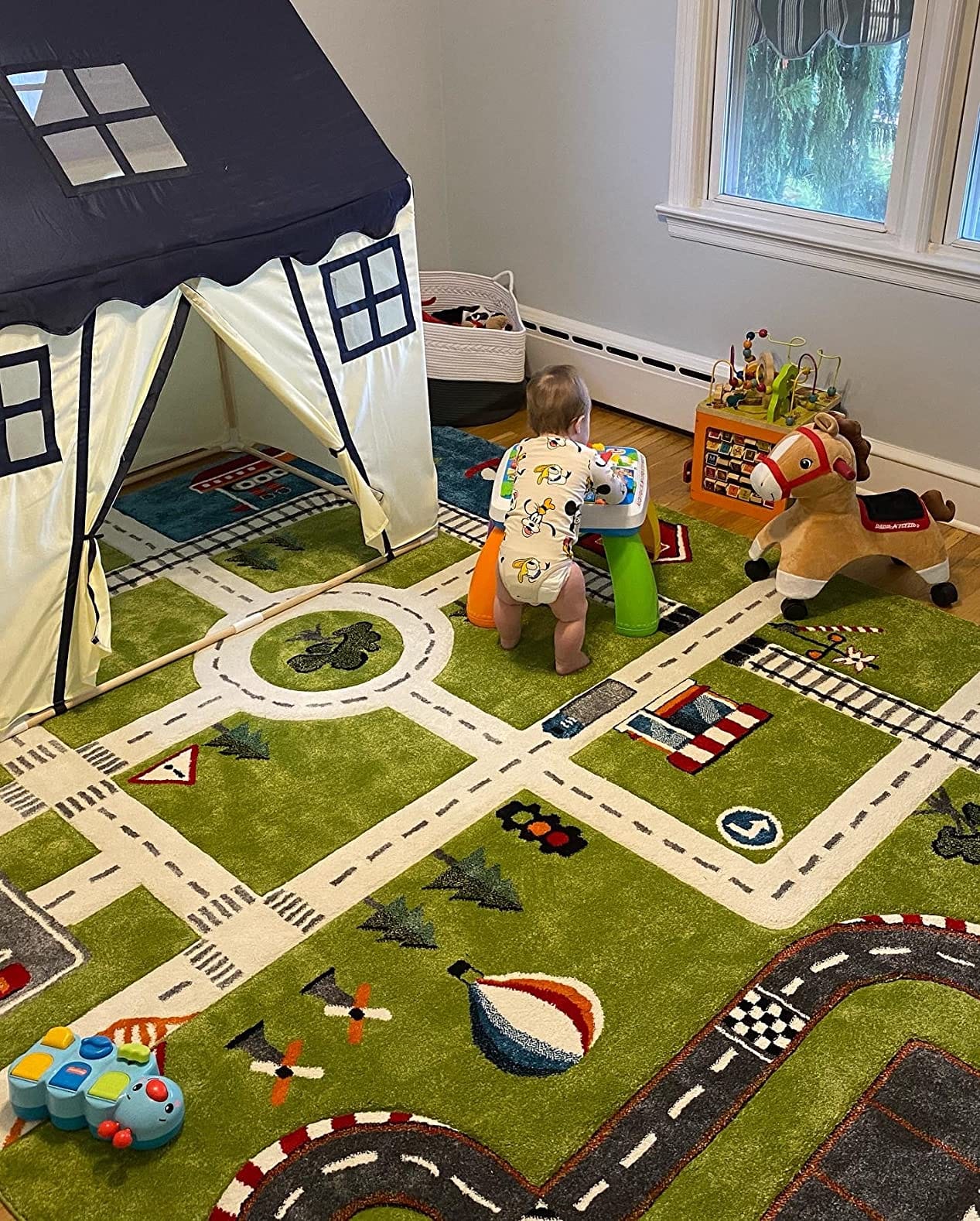 SAFAVIEH Carousel Kids Collection 4' Round Green / Ivory CRK192Y Neighborhood Nursery Playroom Area Rug customer photo 1