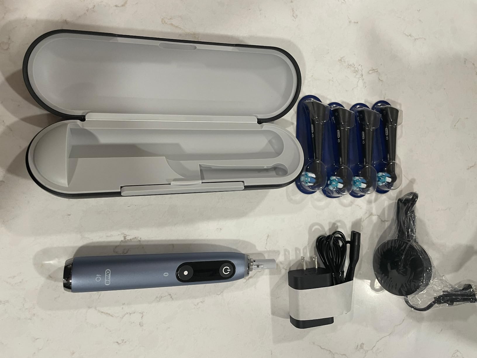 Oral-B Rechargeable Electric Toothbrush, iO Series 9 Genius, Black, 4 Replacement Brush Heads, Power Charging Travel Case, Teeth Whitening, Visible Pressure Sensor to Protect Gums, 7 Modes customer photo 2