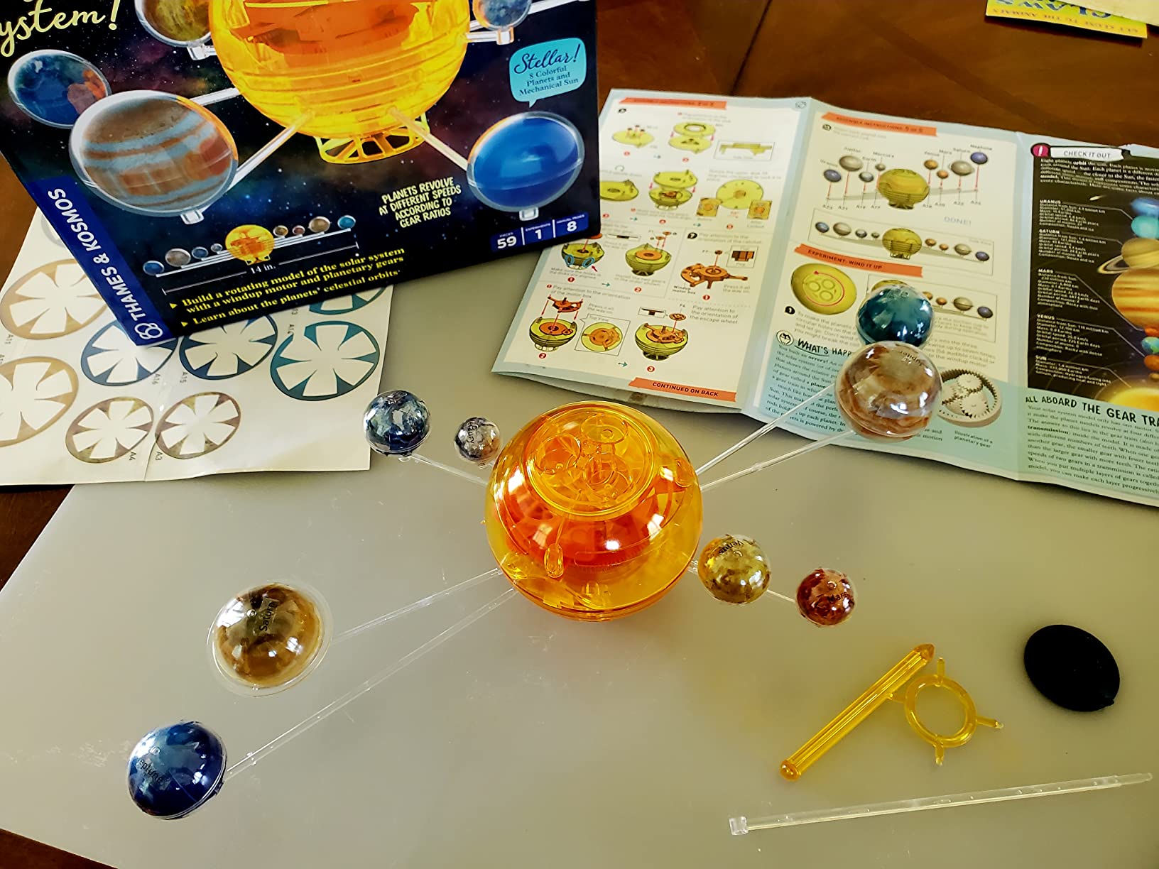 Thames & Kosmos Orbiting Solar System STEM Kit | Build a Rotating Solar System Model | Planets Revolve Using a Windup Motor | Explore Gear Ratios | Science Fairs | Difficulty Level: Intermediate Small customer photo 1