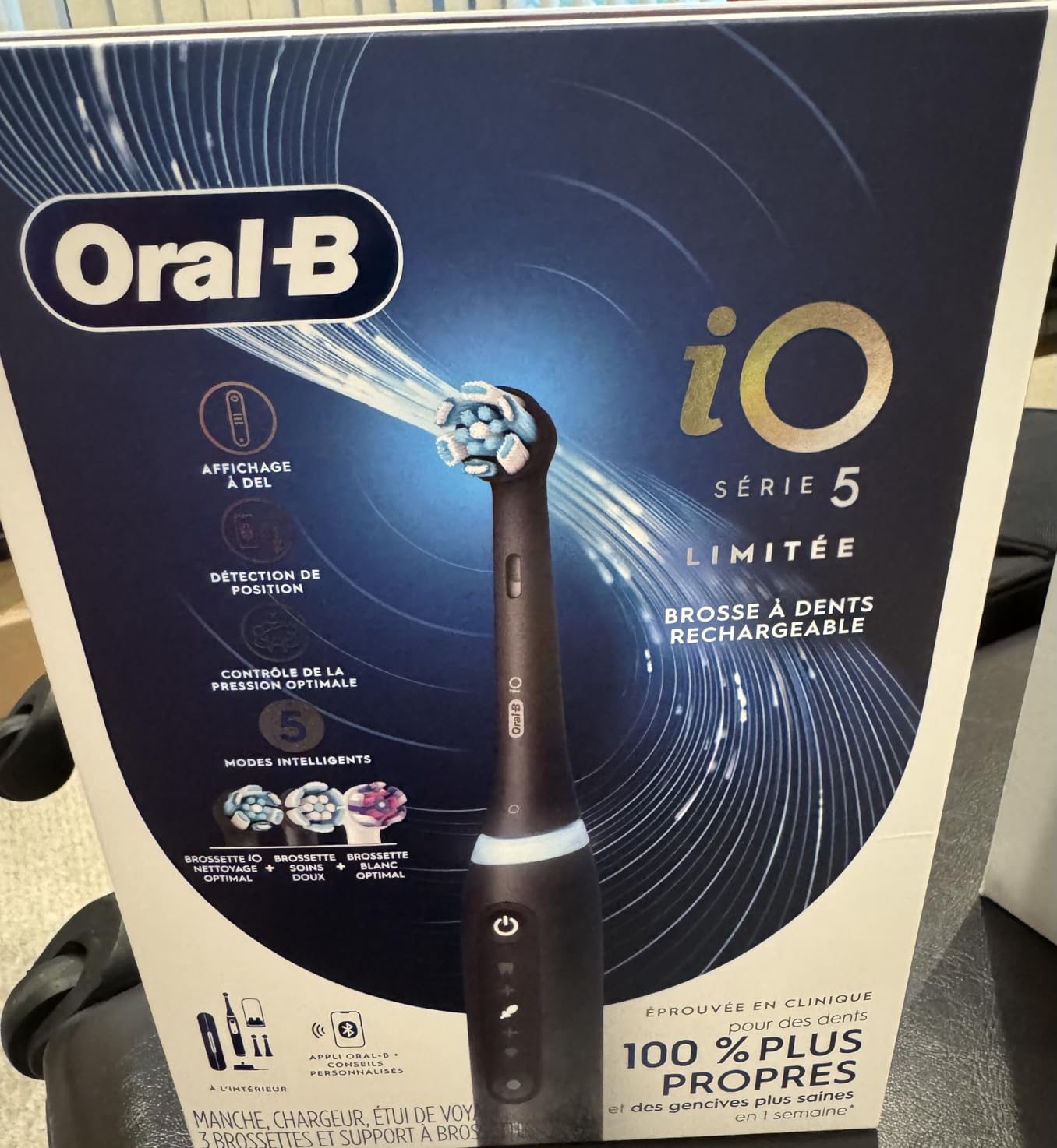 Oral-B Rechargeable Electric Toothbrush, iO5 Limited Deep Clean & Whiten, 5 Cleaning Modes, Visual Pressure Sensor to Protect Gums, Travel Case, 3 Brush Heads, White customer photo 2