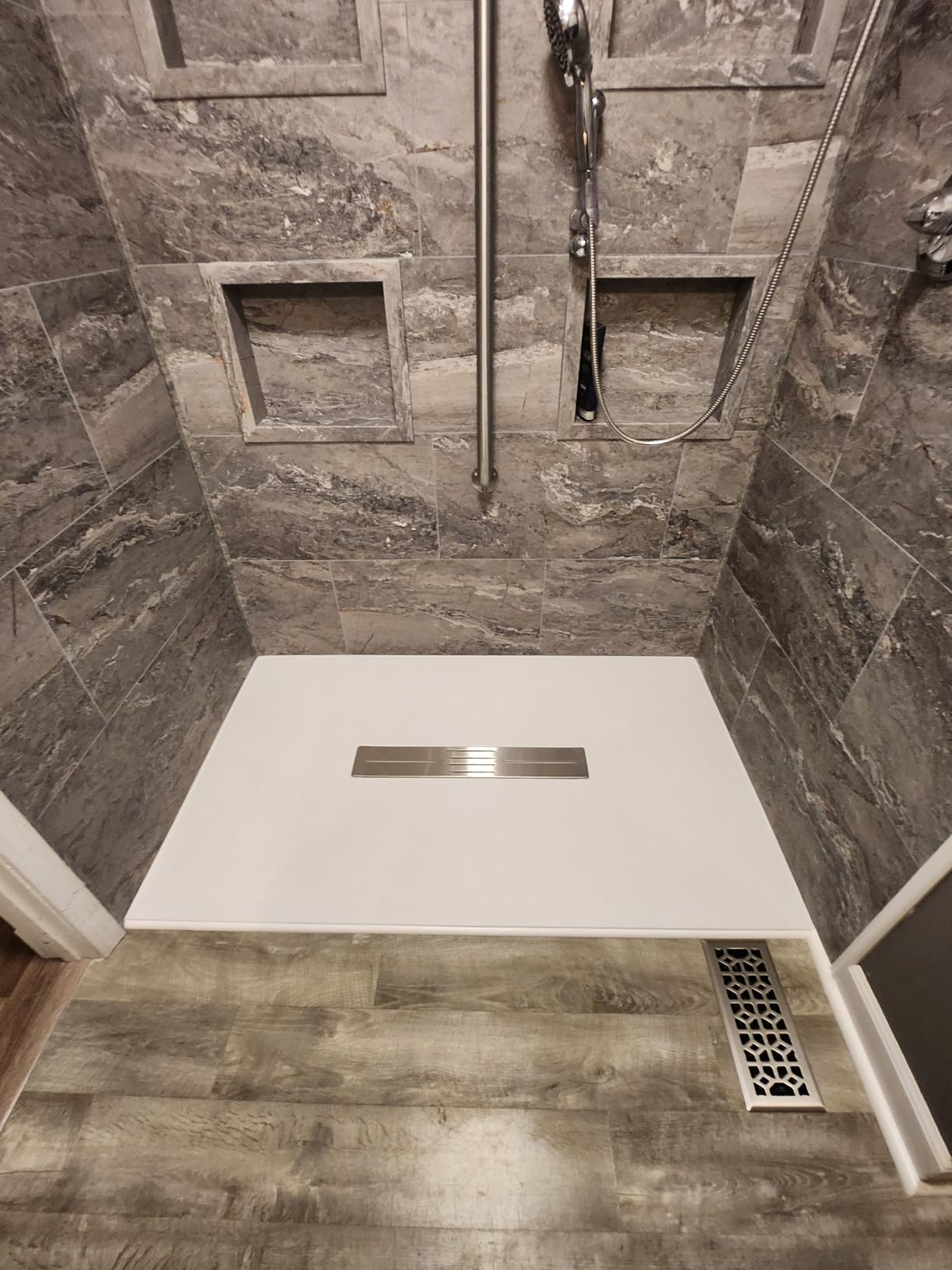 WOODBRIDGE 47.25 in L x 31.5 in W Zero Threshold Shower Base with Center Drain Placement, Matching Decorative Drain Plate and Tile Flange, Wheelchair Access, Low Profile, White customer photo 1