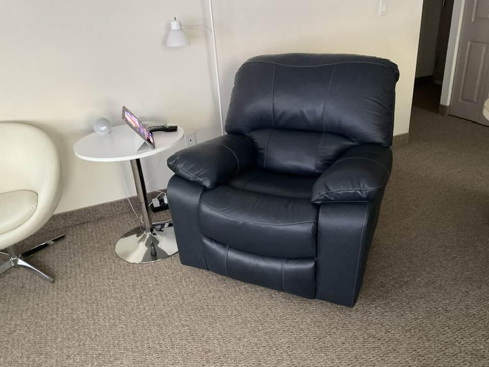 Signature Design by Ashley Leather Power Rocker Recliner Chair, Ocean Blue | Combination of leather and faux leather seating, Space-saving zero wall power recline, Leesworth Series customer photo 2