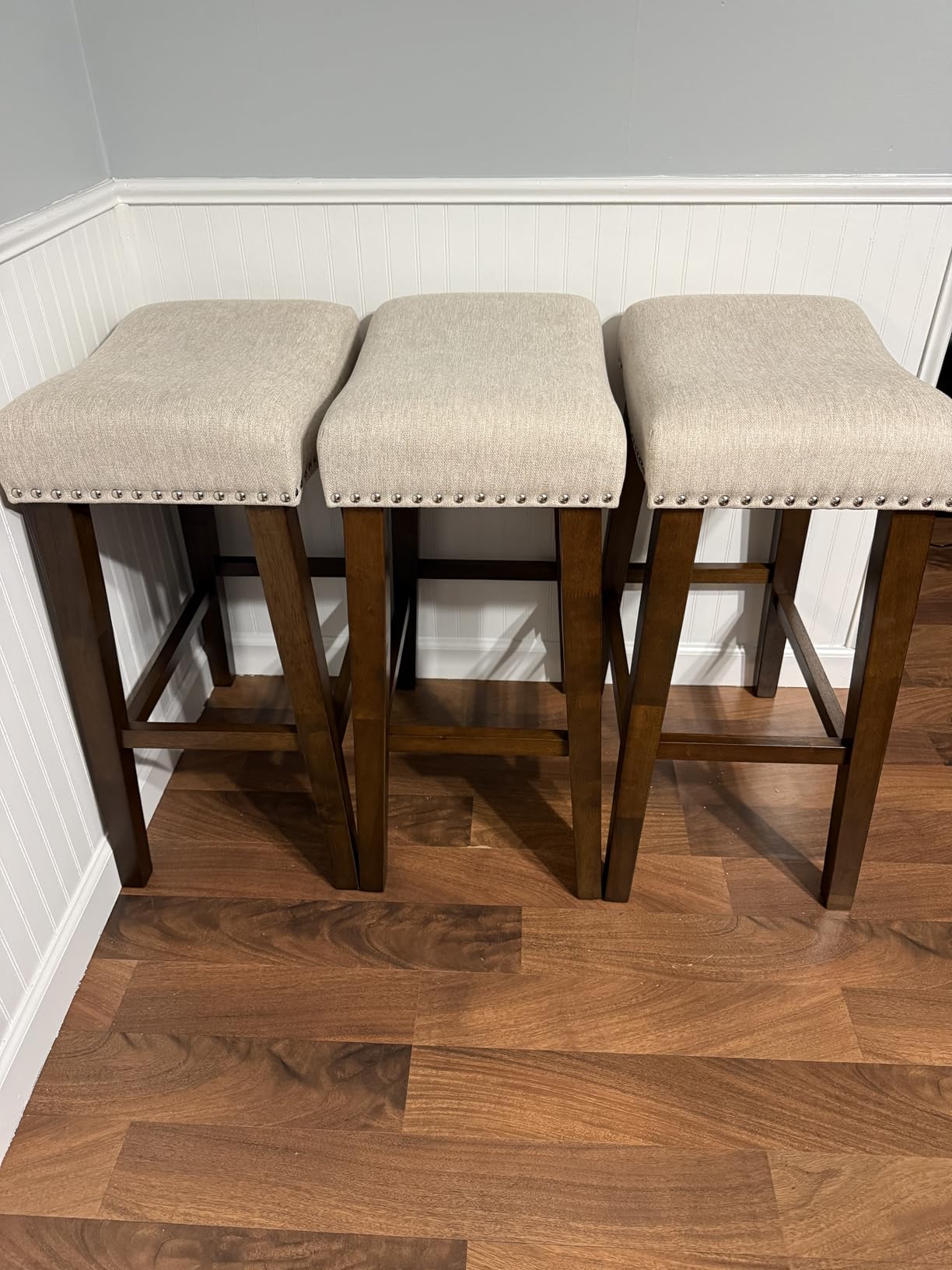 PrimeZone 26 Inch Solid Wood Saddle Backless Bar Stools Set of 2, Beige | Counter Height Barstools with Footrest & Nailhead Trim, Modern Farmhouse Upholstered Linen Counter Stools for Kitchen Island customer photo 2