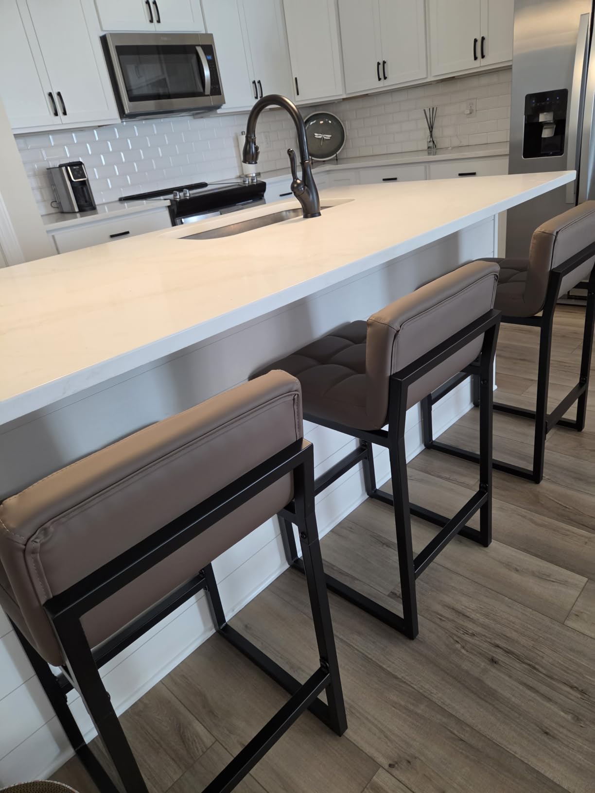 FIRAVOE Counter Height Bar Stools Set of 2, Modern Faux Leather Counter Stools with Low Back and Footrest, Black, 26