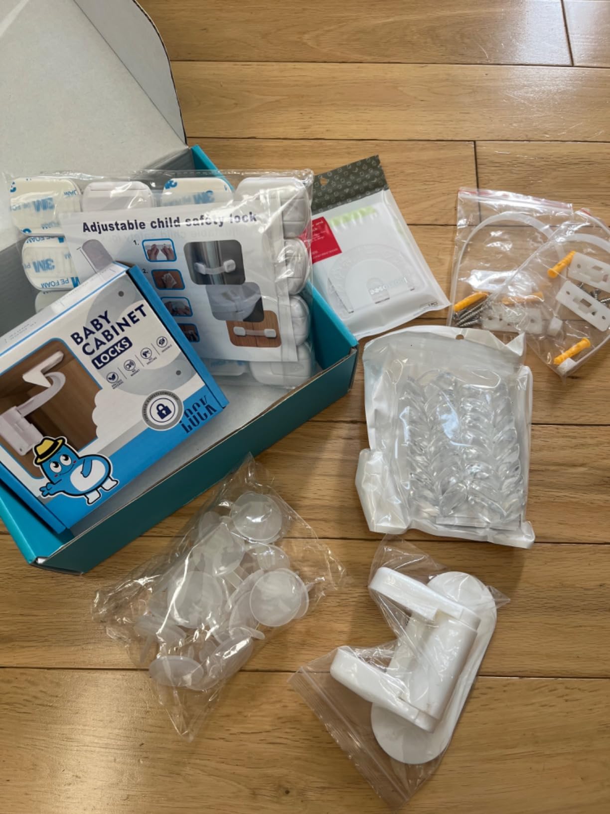 66 Pack Baby Proofing Kit | 12 Hidden Cabinet Drawer Locks, 8 Adjustable Latches, 26 Outlet Covers, 16 Corner Guards, 2 Anti Tip Furniture Anchors Kit, 1 Sliding Door Lock & 1 Door Lever Lock customer photo 1