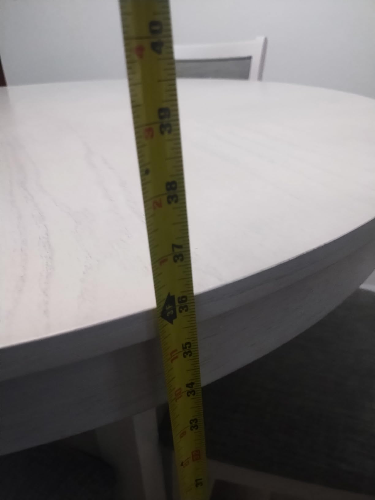 Signature Design by Ashley Round Dining Table Set for 4, Counter Height, 42-inch round table with built-in storage shelves, 4 foam-cushioned light gray barstools, Antique white finish, Erinberg customer photo 1