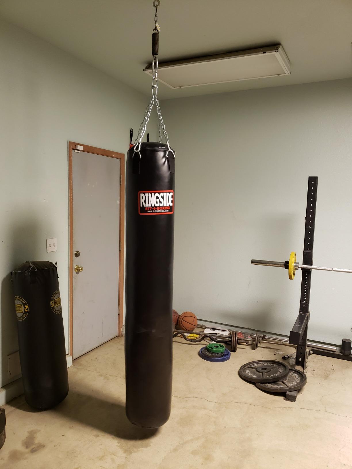 Ringside 100-Pound Muay Thai Heavy Bag, Sturdy Powerhide Punching Bag for Boxing, MMA, Muay Thai, and Kickboxing Training and Workout, Includes Chain and Swivel, Black, 72