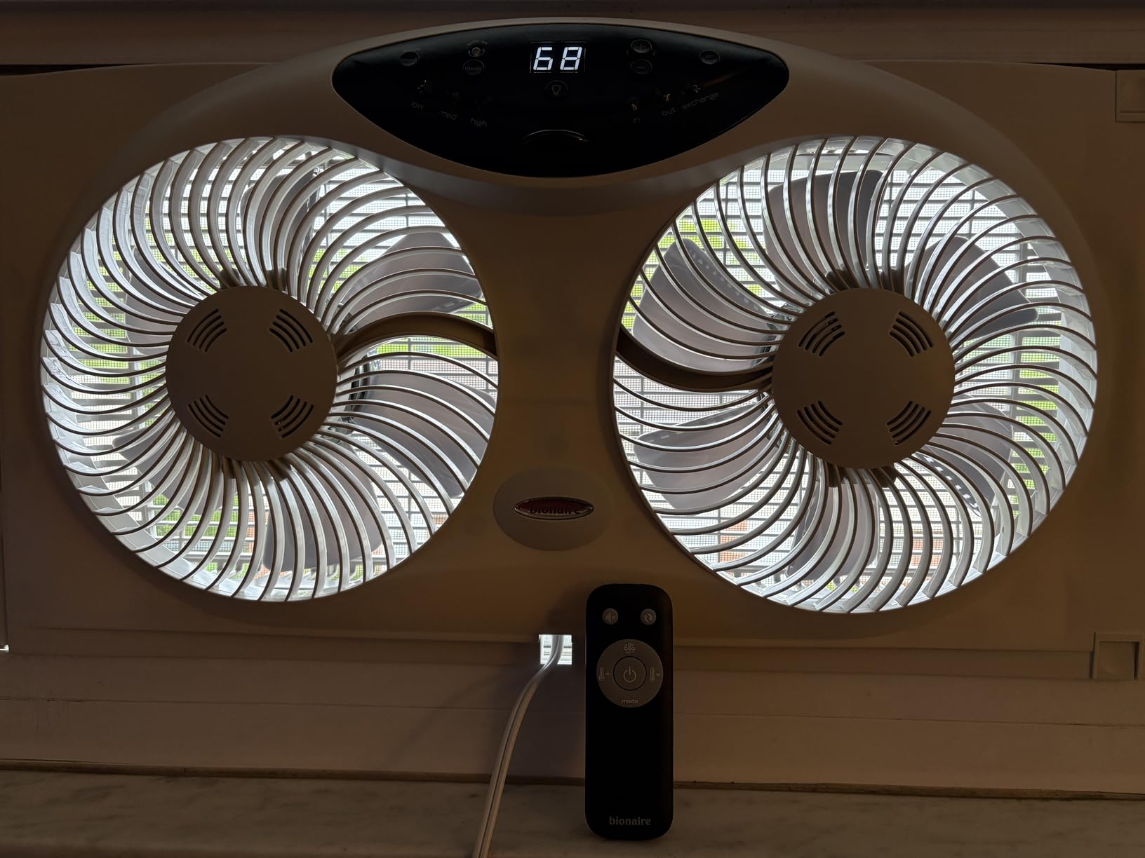 Bionaire Window Fan with Reversible Airflow Blades – 3-Speed Settings, Programmable Thermostat, LED Display, Remote Control, Fits 24–36