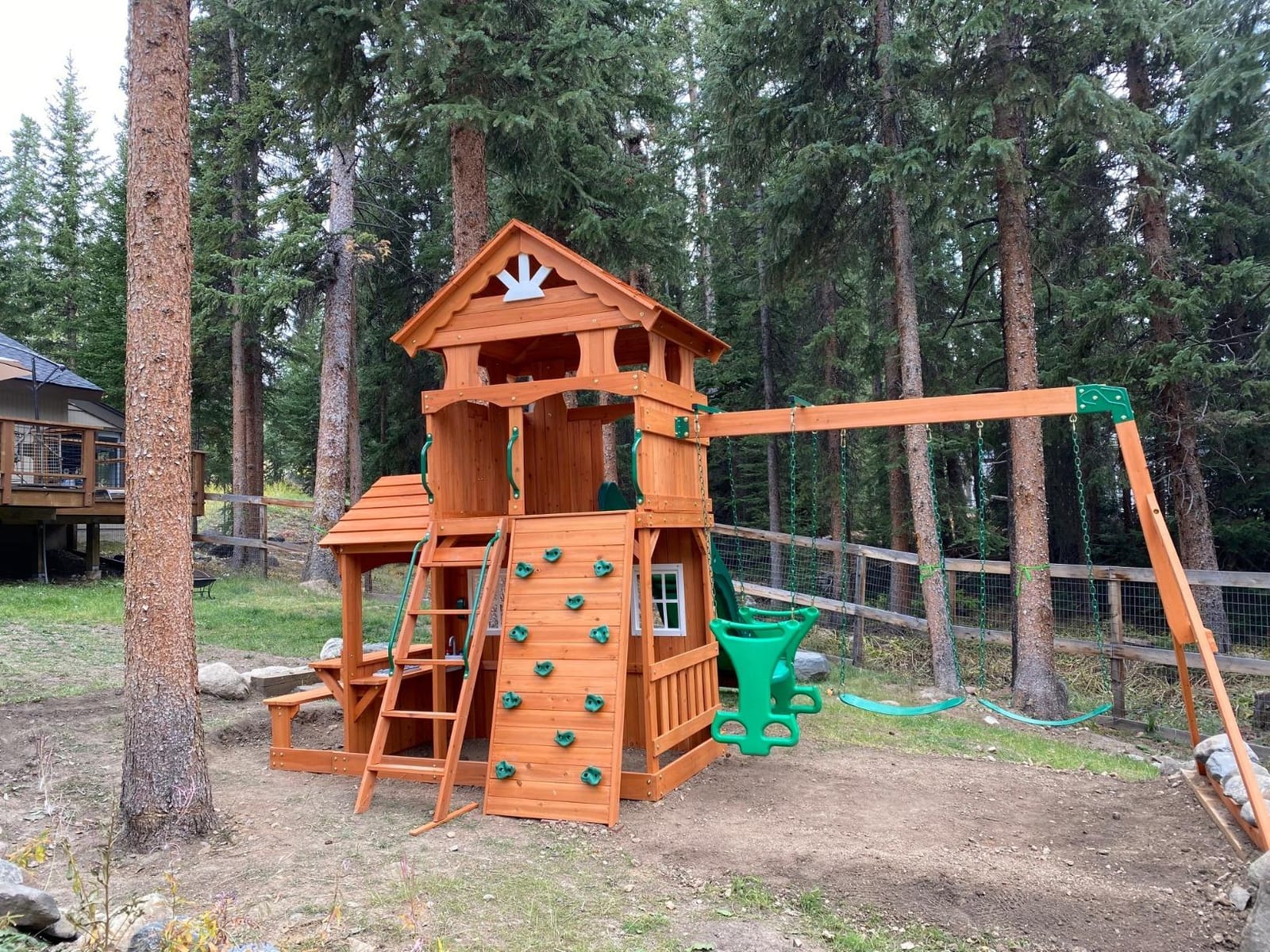 Backyard Discovery Shenandoah Cedar Wood Swing Set with Wave Slide, Raised Clubhouse, Playhouse, Play Kitchen, Belt Swings, Trapeze, Rock Wall, Ladder, Picnic Table, Full Door, Outdoor Playset customer photo 1