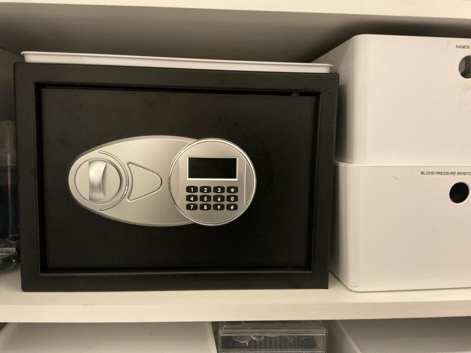 Amazon Basics Steel Security Safe and Lock Box with Digital Keypad, Easy to Use, Removable Shelf, Secure Cash, Jewelry, Documents, Black, 1.2 Cubic Feet, 16.9-x-14.6-x-10.6-inches (WxDxH) customer photo 1