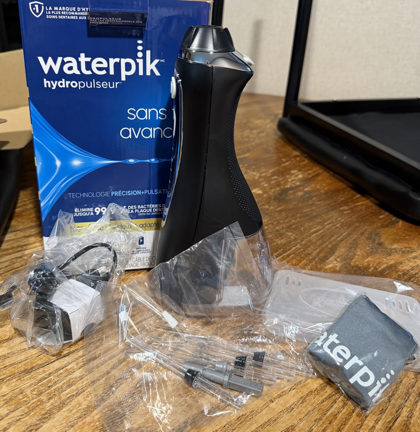 Waterpik Cordless Advanced Portable Water Flosser, Rechargeable, White | 3 Settings, 4 Tips, Travel Bag, for Gums, Teeth, Dental Braces, Implants, Shower Use ADA Accepted WP-580 Packaging May Vary customer photo 1