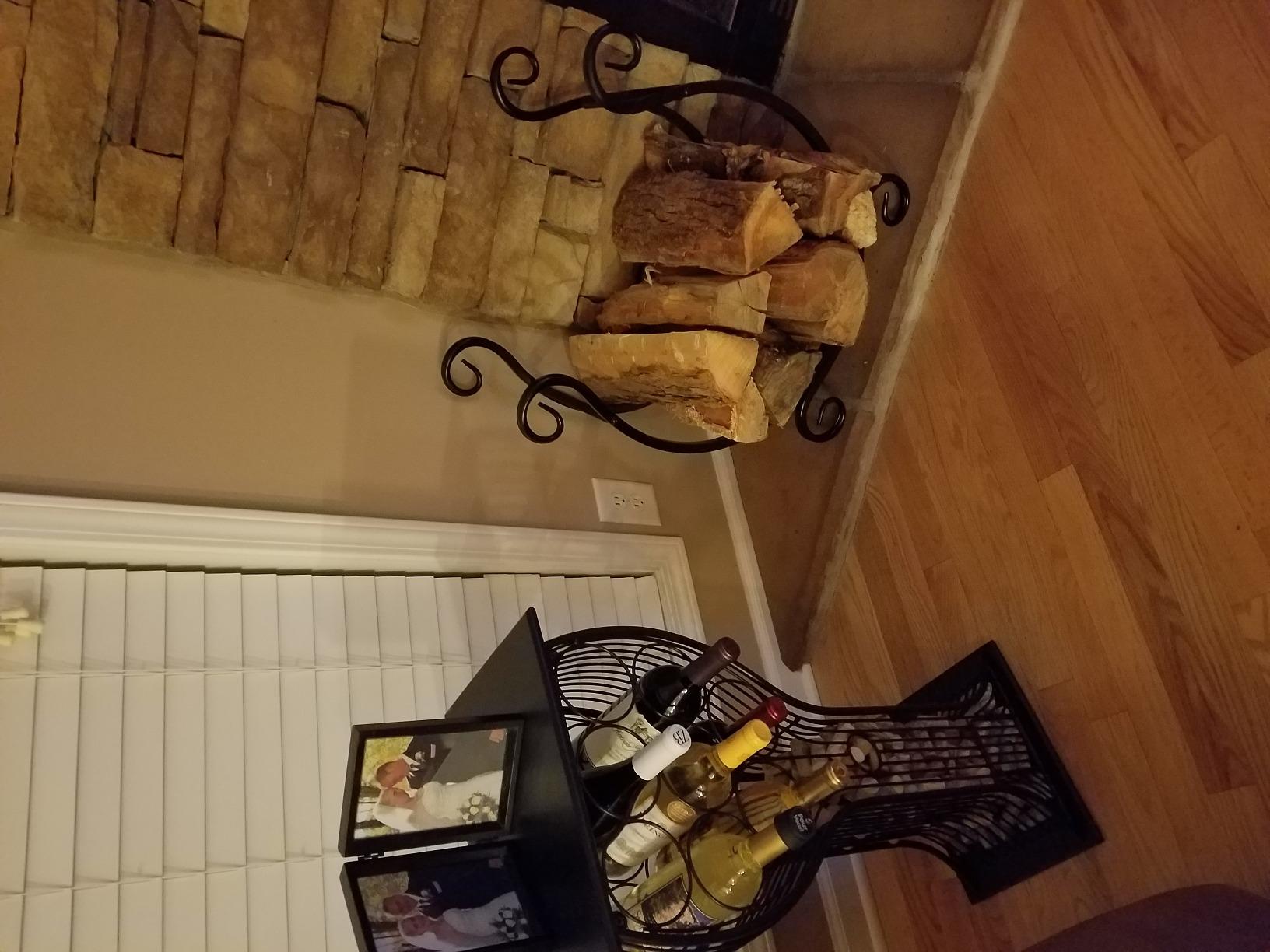 MyGift Black Metal Freestanding Firewood Rack with Scrollwork Design customer photo 1
