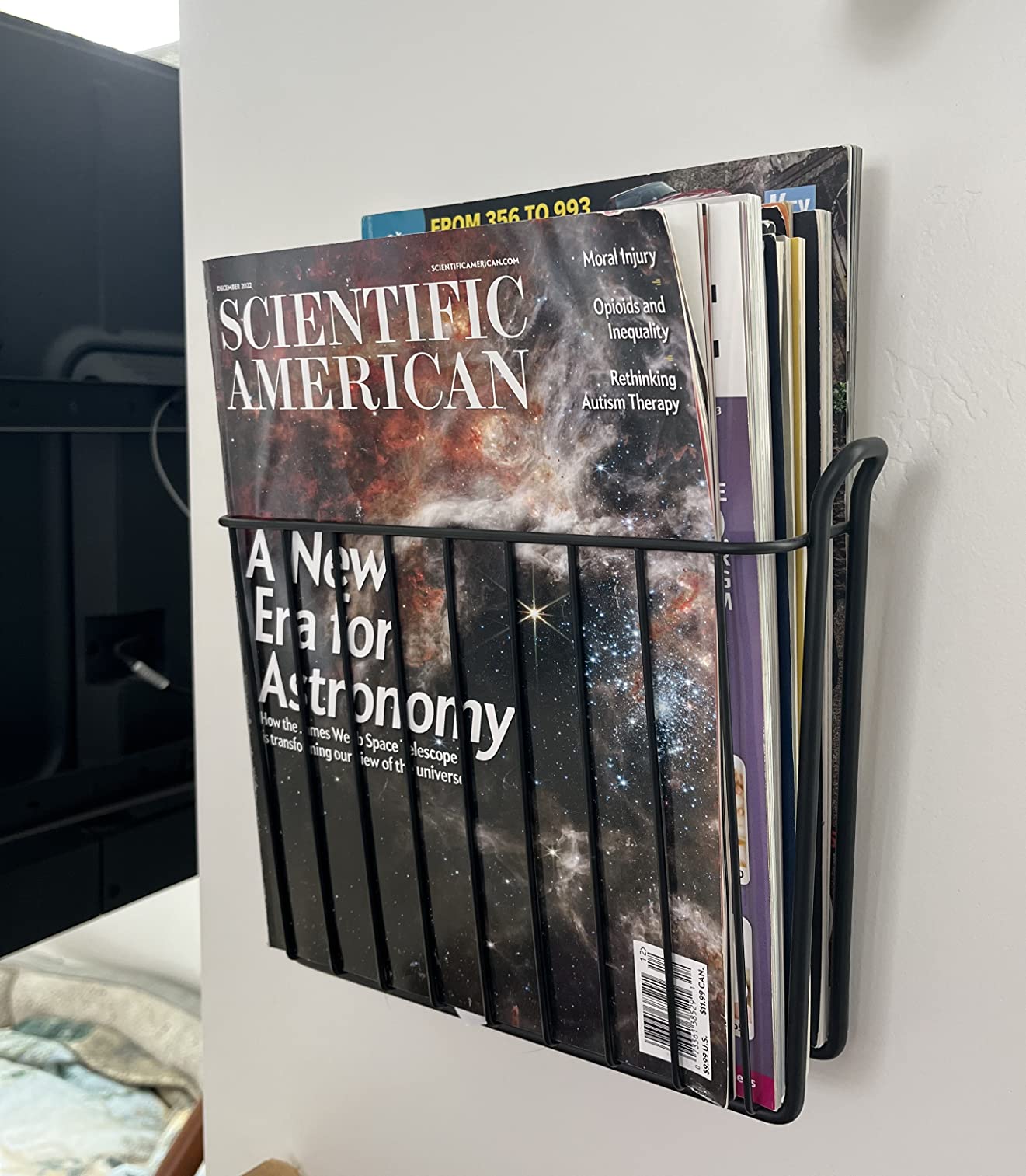 mDesign Metal Wall Mount Decorative Magazine Rack Organizer Bin Holder, Basket for Living Room, Bathroom, Bedroom, Home Office - Holds Books, Newspapers, Tablets - Concerto Collection - Black customer photo 1
