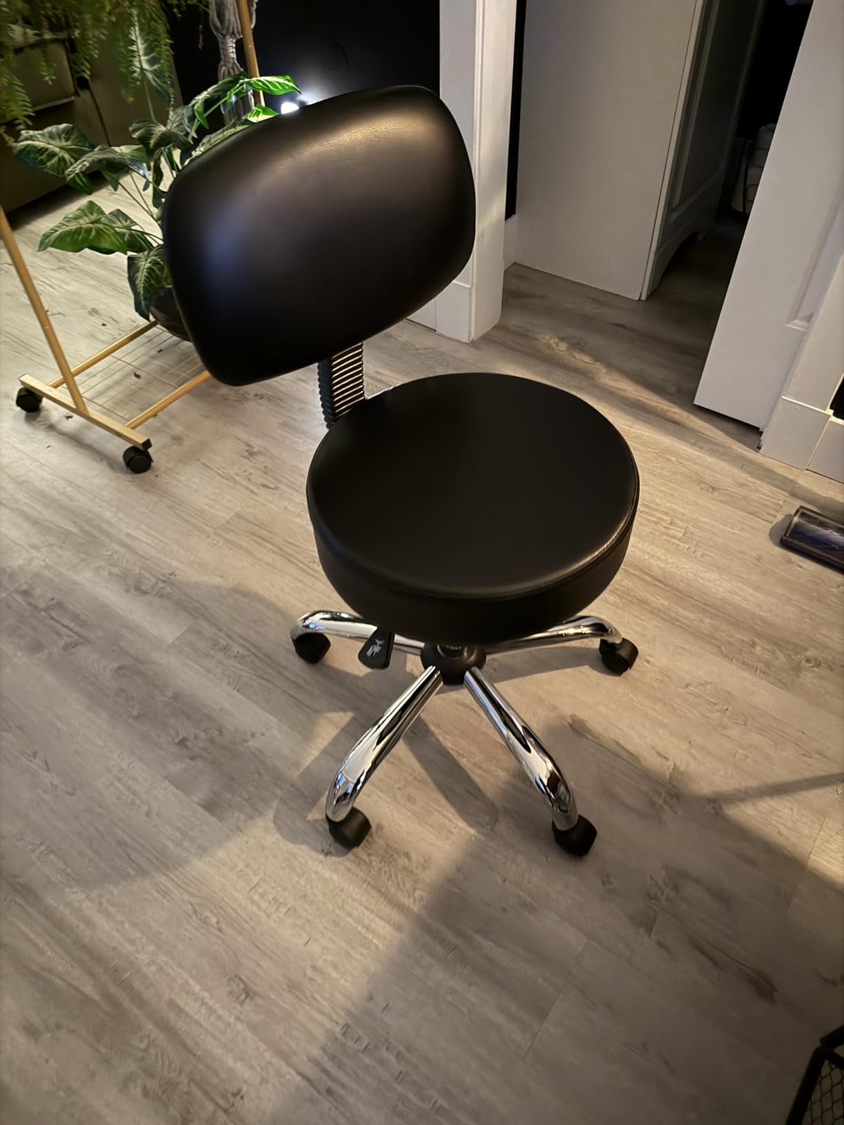 Amazon Basics Multi-Purpose Drafting Spa Bar Stool with Back Support, Upholstered, and Wheels, Black, 22.72