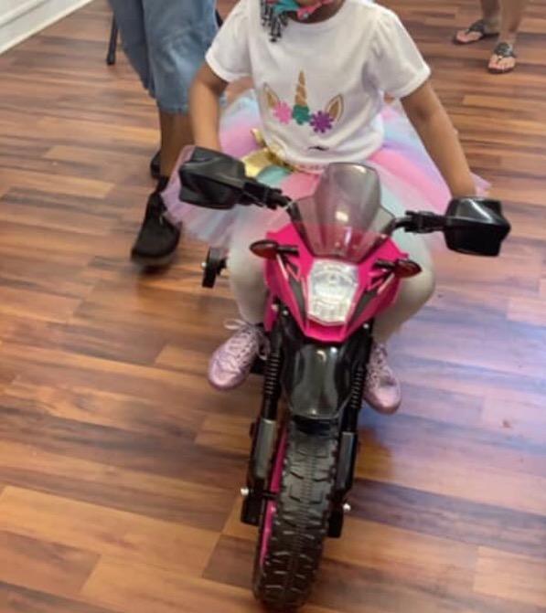 Huffy Ride on Motorcycle for Kids, Ideal for Ages 2-5 Years Old, 6V Ride On Motorcycle, Training Wheels, Realistic Engine Sounds, Simple Wall Charger, Max Weight 65lbs, 2 MPH, Pink customer photo 2