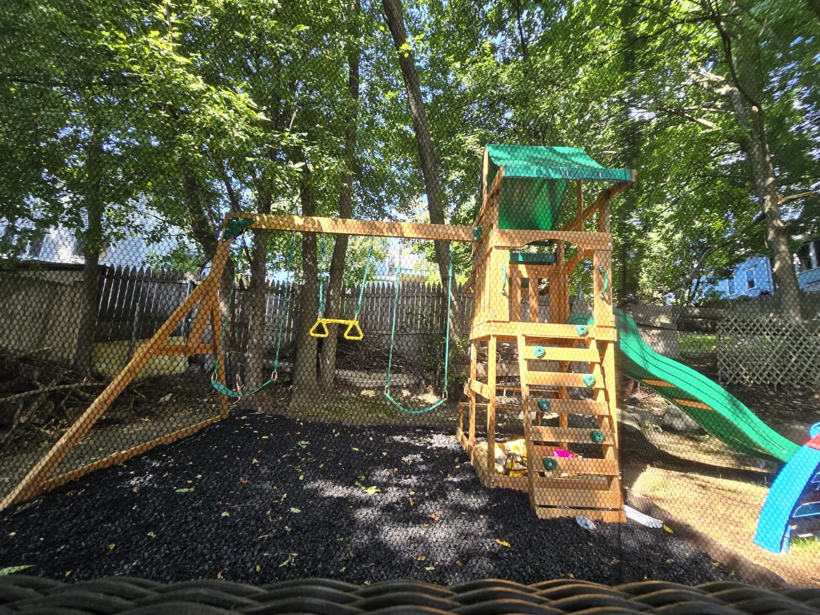 Backyard Discovery Beach Front Cedar Wood Swing Set with Wave Slide, Play Deck, Monkey Bars, Rock Wall Ladder, Shaded Picnic Area, Snack Bar, Belt Swings, Trapeze, Sandbox Area, Outdoor Playset customer photo 2