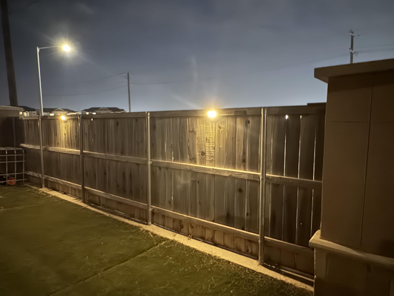 HMCITY Solar Lights Outdoor 120 LED with 3 Lighting Modes, Motion Sensor Wall Lights,IP65 Waterproof Solar Powered for Garden Patio Yard (Back Button 2Packs, Black Shell-Daylight White) customer photo 1