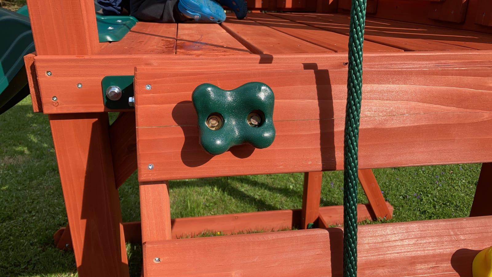 Gorilla Playsets Playmaker Deluxe Wooden Swing Set with Vinyl Canopy Roof, Dual Wave Slides, and Rock Climbing Wall, Redwood Stained Cedar customer photo 1