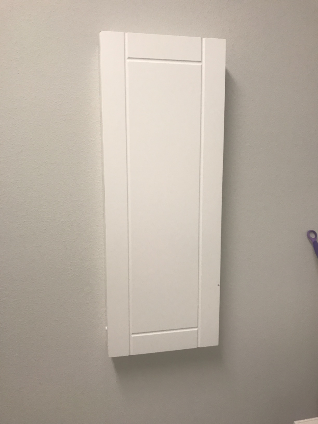 Ivation Wall-Mounted Ironing Board Cabinet, Foldable Ironing Storage Station for Home, Apartment , Easy-Release Lever, Garment Hooks, White customer photo 2
