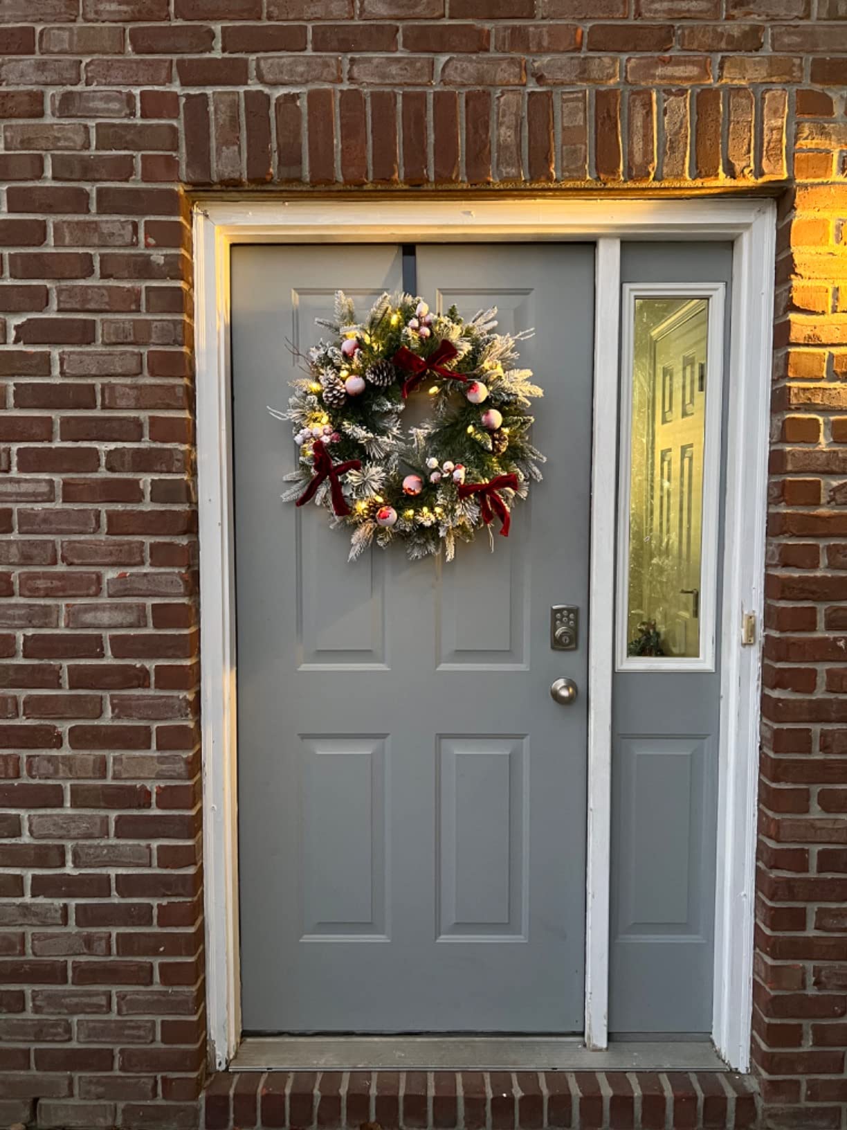 Pre-lit Snow Christmas Wreath with Red Balls,Berries and Bows,24 Inch 50 Battery Operated LED Lights,Holiday Decoration for Front Door Outdoor customer photo 2