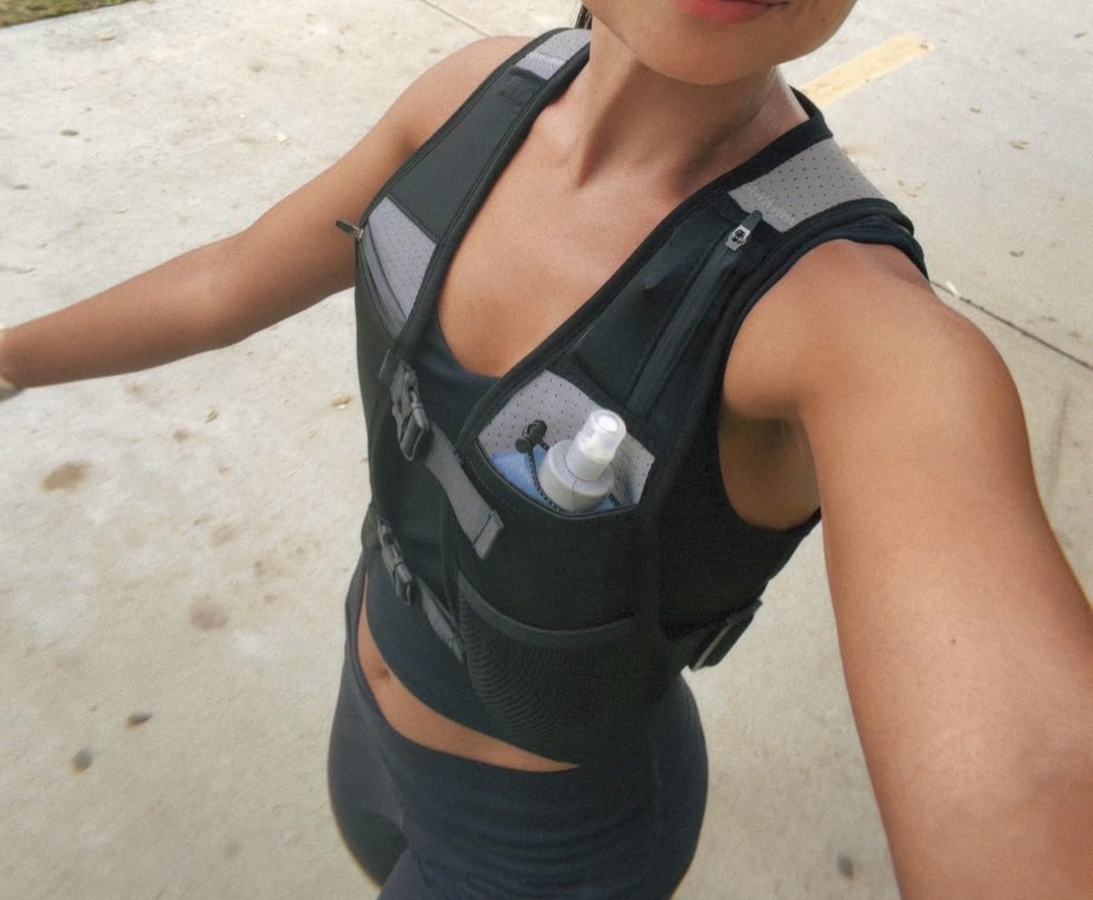 Running Phone Holder Vest with 500ml/17oz Water Bottle | Reflective Hydration Vest | Adjustable | Light | 6 Pockets for Running Accessories | Unisex customer photo 2