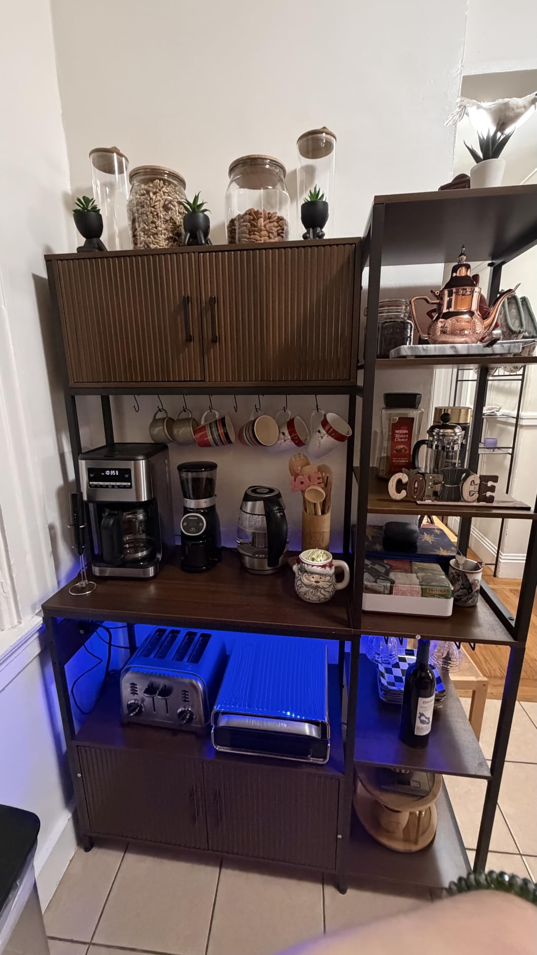Itaar Bakers Rack with Power Outlet and LED Light, 45.3 Inch Farmhouse Coffee Bar Cabinet, Kitchen Microwave Stand with Storage, Glass Cabinet, Goblet Holder and 8 Hooks, Black customer photo 1