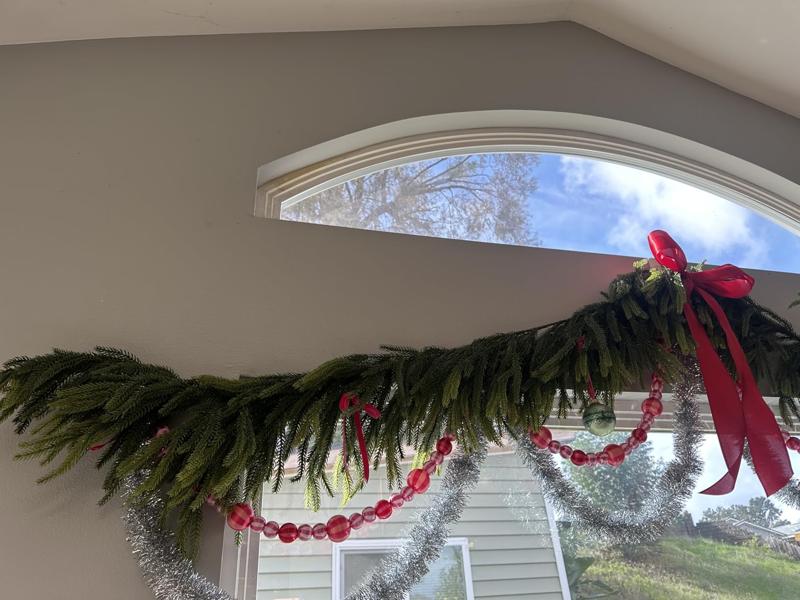 N&T NIETING 9FT Christmas Norfolk Pine Garland Real Touch Artificial Greenery Garlands Faux Winter Garland for Mantle Fireplace Table Stair Front Door Indoor Outdoor Holiday Xmas Decorations (1 Pcs) customer photo 1