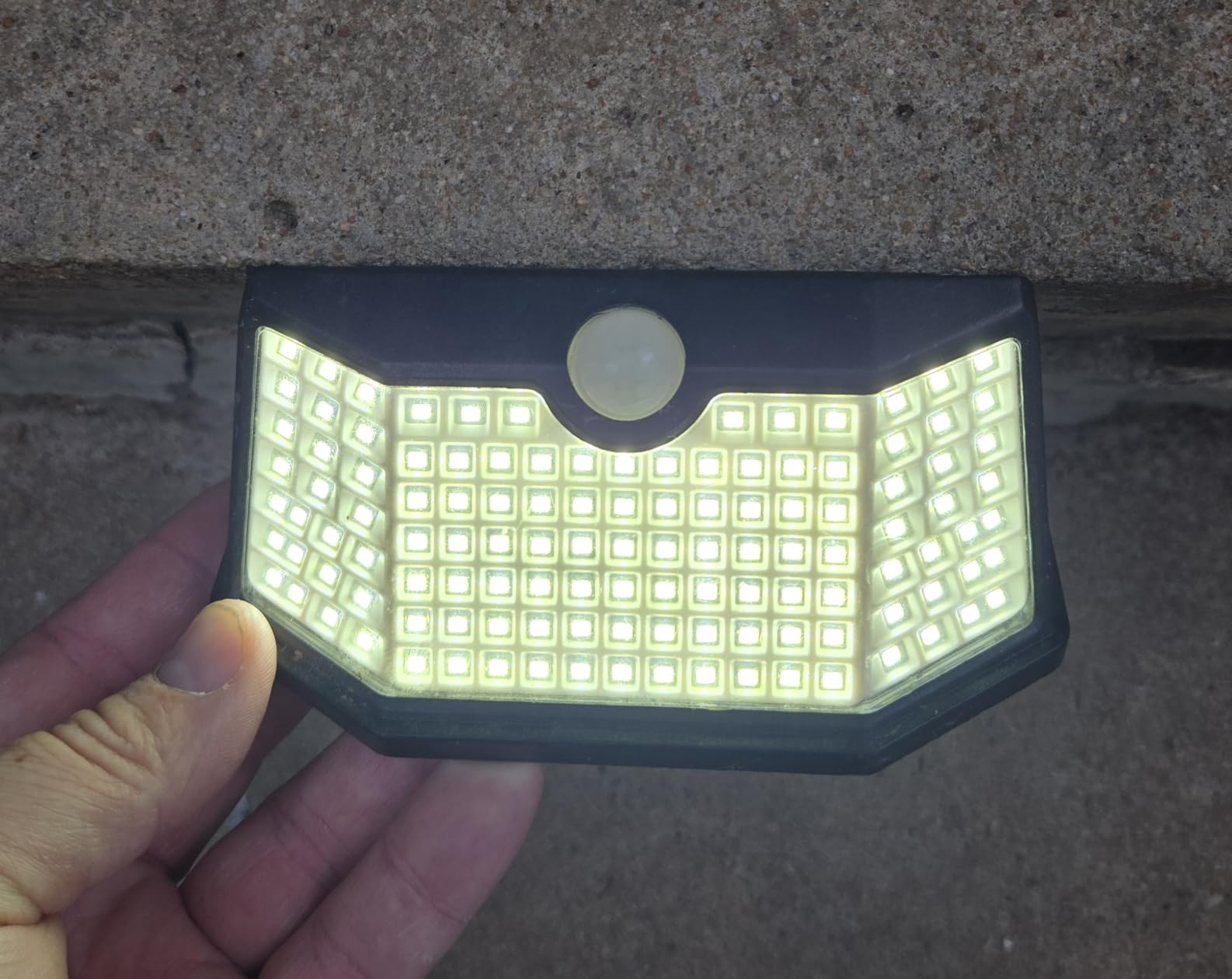 HMCITY 120 LED Outdoor Solar Lights with Motion Sensor and 3 Lighting Modes, IP65 Waterproof Wide Solar Wall Lights Ideal for Garden Patio Yard (Front Button 6Packs, Black Shell-Daylight White) customer photo 2
